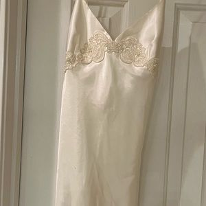 white silk chemise with embroidery.